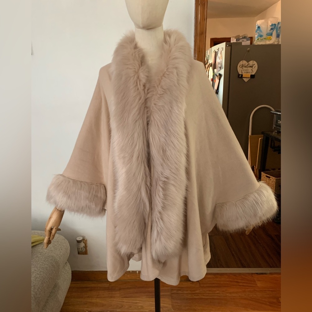 Polyester knit cape.